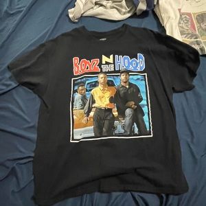 shirts are slightly used. the monsters t-shirt has black markings.